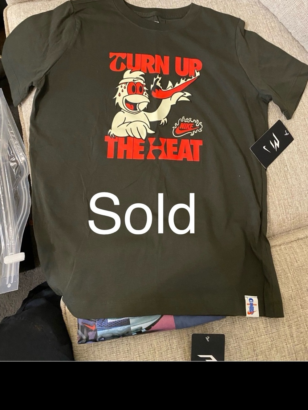 Nike Men’s Black Graphic Tee with Red and Cream Print